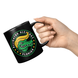 Alligator_Alcatraz_Gator_Trump_Hair_Blac_11oz_Black_RH_Model_Mockup.png