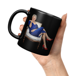 Funny_Bill_Clinton_in_Blue_Dress_Coffee__11oz_Black_LH_Model_Mockup.png