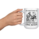 Im_This_Close_To_Flippin_Tables_Like_J_15oz_White_LH_Model_Mockup.png
