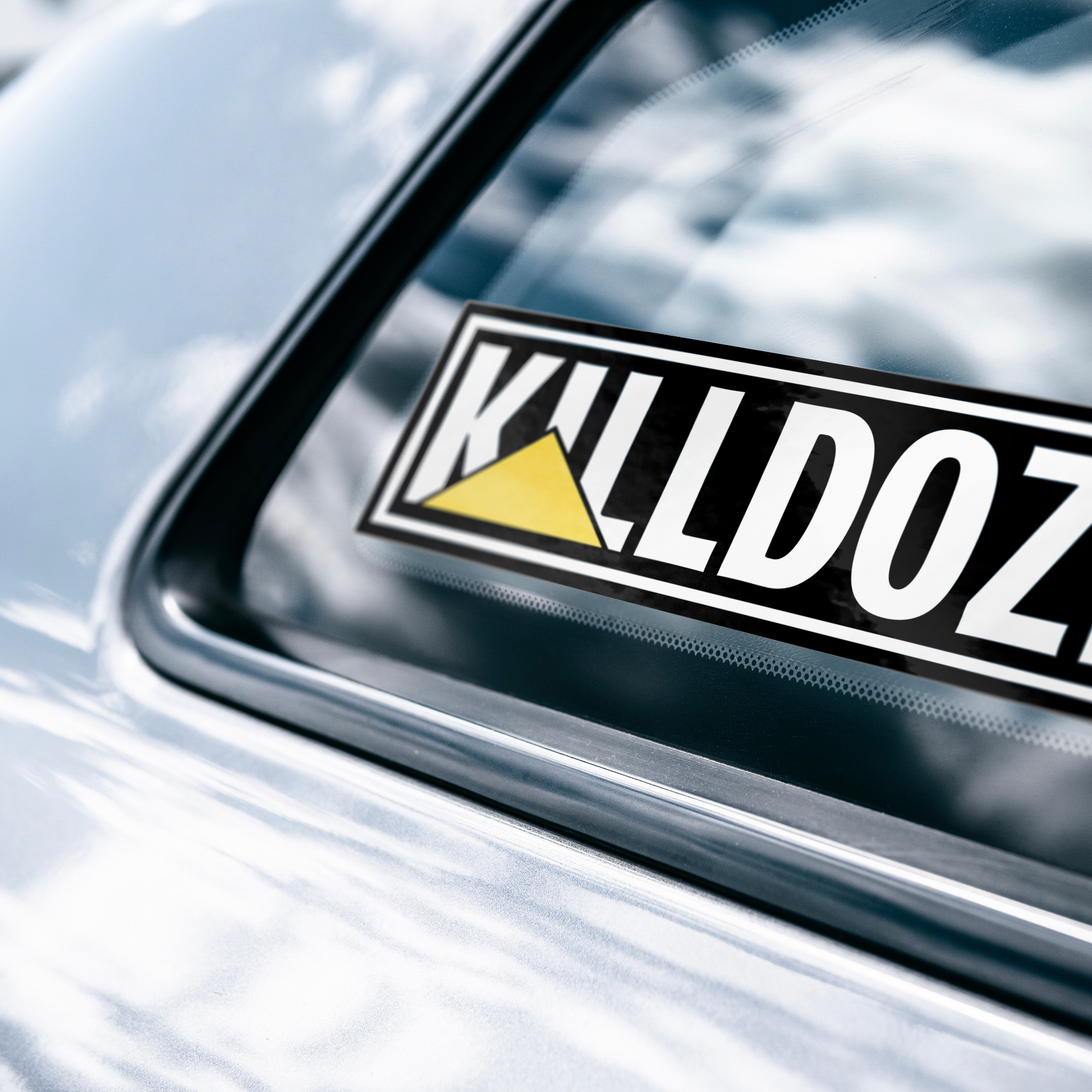 Killdozer_Bumper_Sticker_WhiteBumperSticker-CarWindow_Mockup.png