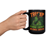 TRUMP_-_Scaring_Liberals_Since_2016_Blac_15oz_Black_LH_Model_Mockup.png