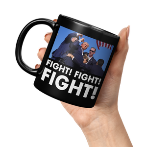 Trump_Fight_Fight_Fight_Black_Coffee_Mug_11oz_Black_LH_Model_Mockup.png