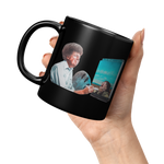 Trump_Painting_Screaming_Liberal_Black_C_11oz_Black_LH_Model_Mockup.png