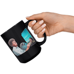 Trump_Painting_Screaming_Liberal_Black_C_15oz_Black_RH_Model_Mockup.png
