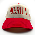 American flag snapback hat with red embroidered Merica text on cream and red cap