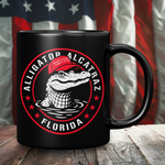 Drunk America 11oz black coffee mug front view with Florida MAGA alligator graphic