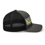 Black and gray trucker hat with bold 'KILL' logo and yellow triangle, mesh back design