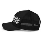 Black trucker hat with 'OZER' embroidered in white, mesh back, flat brim, patriotic style