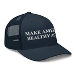 Navy trucker hat with 'MAKE AMERICA HEALTHY AGAIN' in white text, patriotic design for American pride.