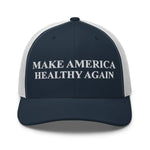 Navy blue trucker hat with white mesh back and embroidered 'MAKE AMERICA HEALTHY AGAIN' text