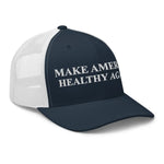 Navy and white trucker hat with 'MAKE AMERICA HEALTHY AGAIN' embroidered text, patriotic apparel