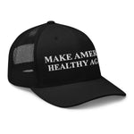 Black trucker hat with 'MAKE AMERICA HEALTHY AGAIN' text and USA flag mesh, patriotic apparel